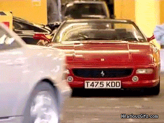 idiot-in-old-ferrari-car.gif
