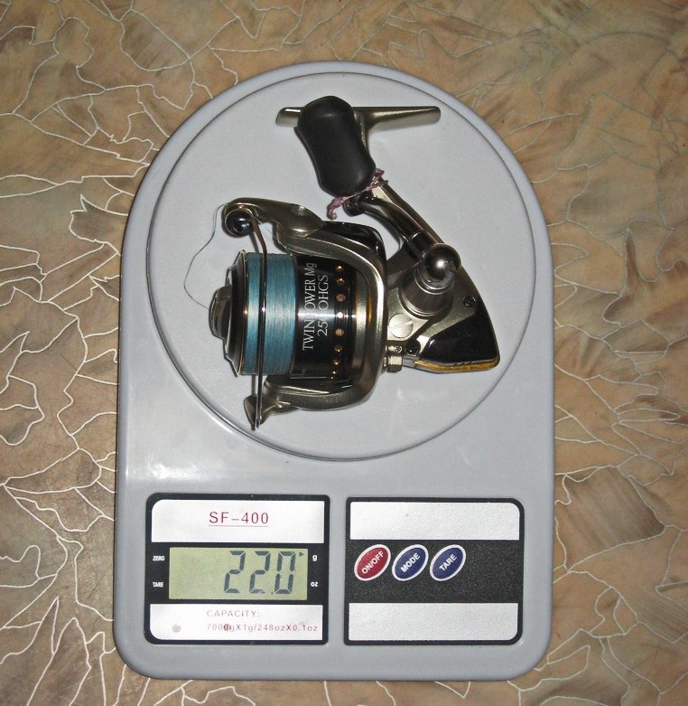 Реальный полный вес катушки:Shimano Twin Power 06 Mg 2500HGS с шнуром и бекингом.